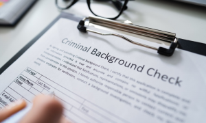 a landlord reviewing a tenant's background check